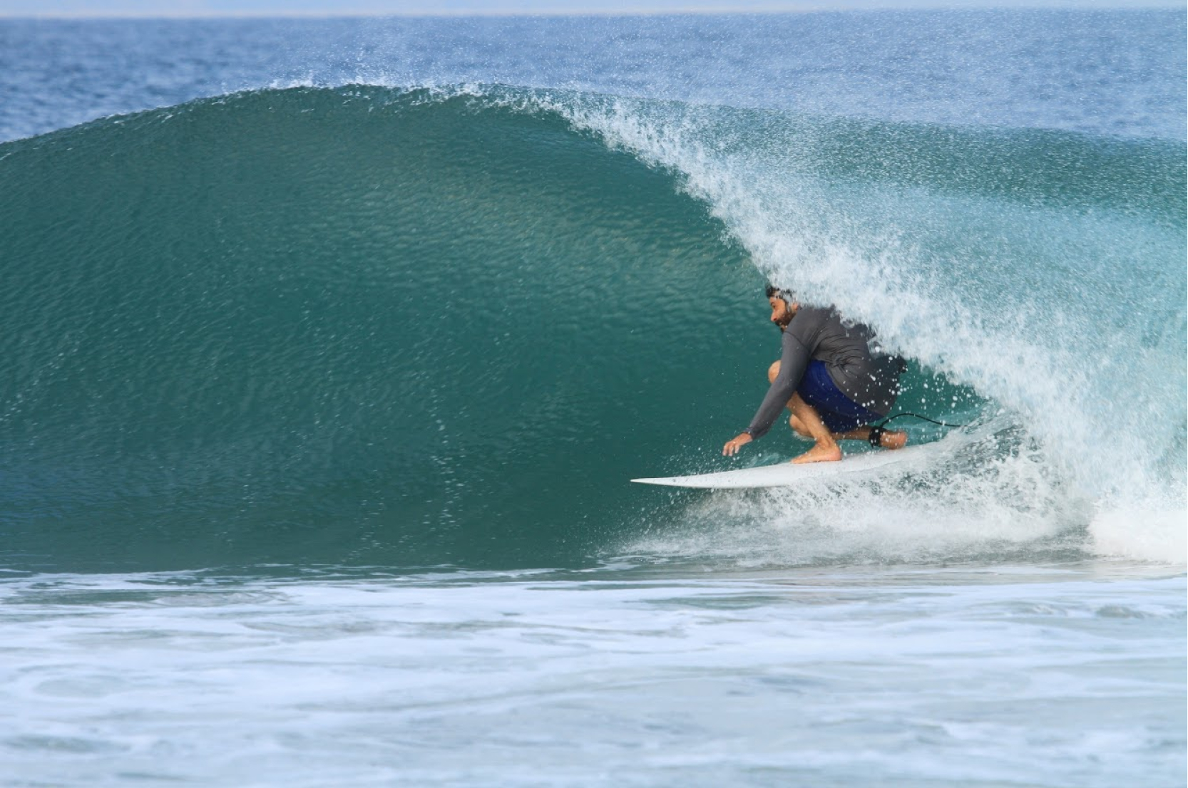 Shea Somma surfing a channeled twin pin custom surfboard in Oaxaca, Mexico.