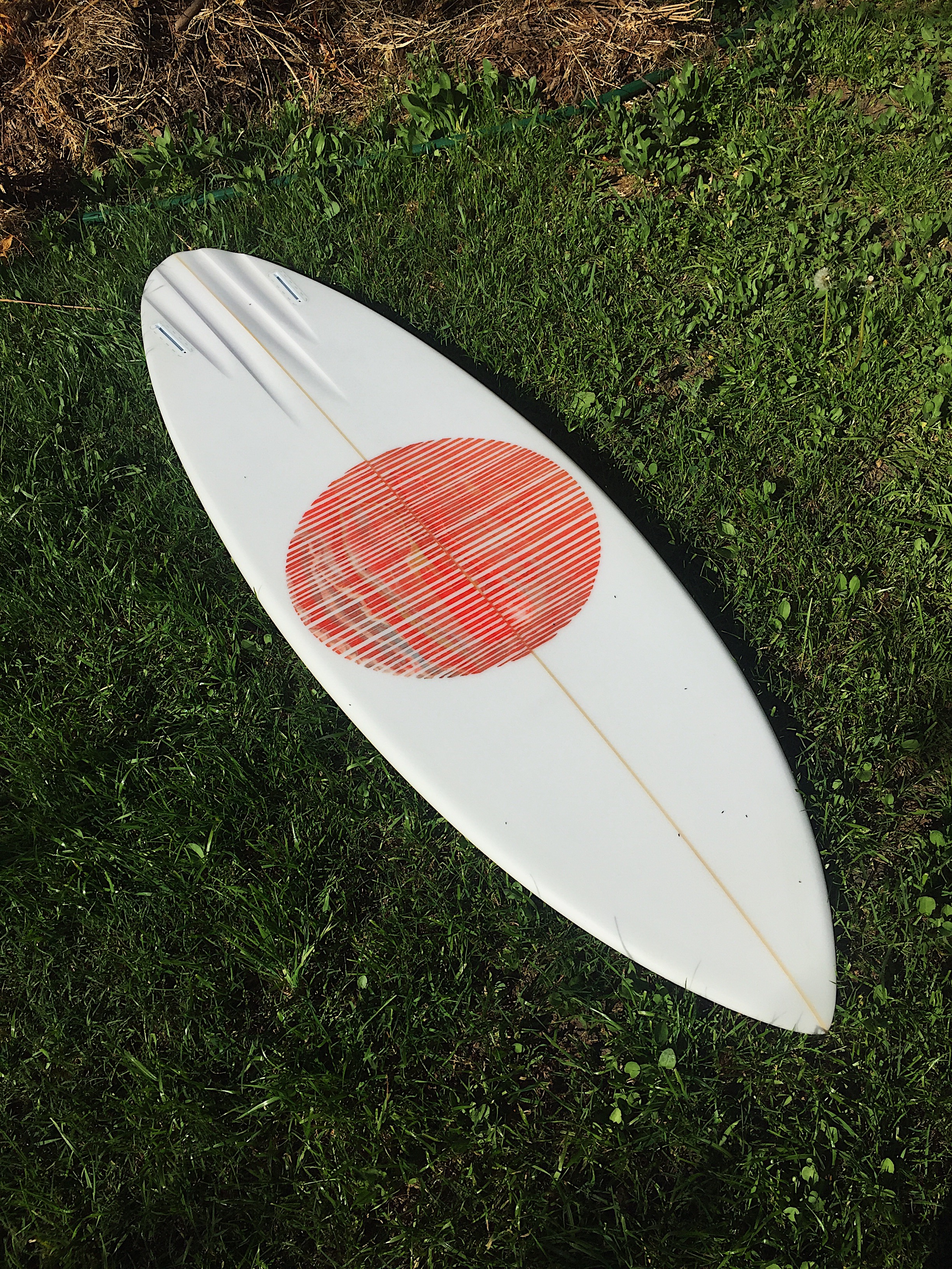 Custom channel bottom twin fin surfboard hand shaped by shaper Shea Somma of San Luis Obispo California